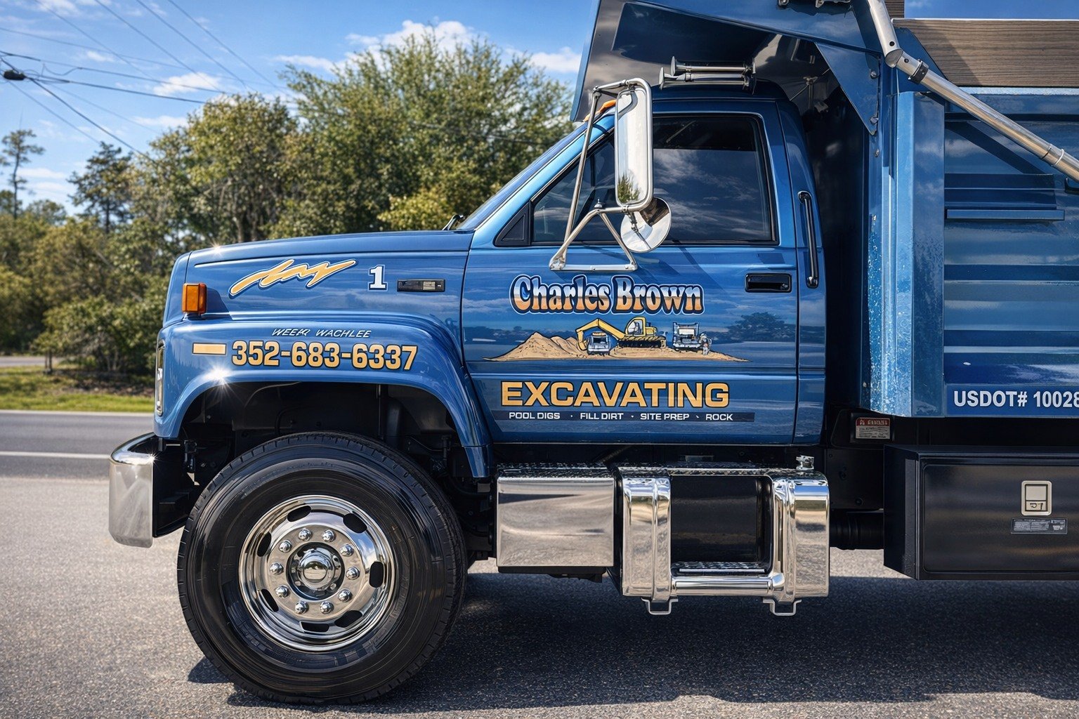 Charles Brown Excavating polished blue GMC dump truck — Fleet Truck #1, Weeki Wachee FL